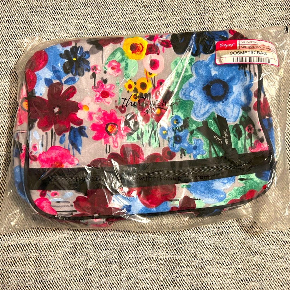 Thirty one makeup bag unopened.